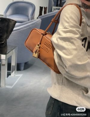 Miumiu Long Handled Bowling Ball Can Be Used Under the Armpit