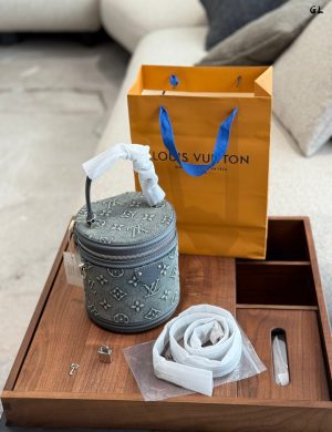 LV Cowboy Wealth Bucket 15 × 19