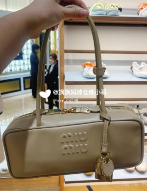 Miumiu's New Sesame Sauce Colored Bowling Underarm Bag