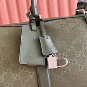GUCCI-GG-RUBBER-EFFECT-LARGE-DUFFLE-BAG-BG145-9.webp