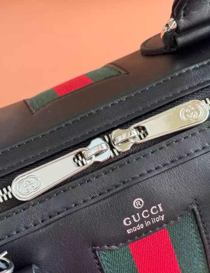 GUCCI-WEB-TRADEMARK-SMALL-DUFFLE-BAG-IN-BLACK-LEATHER-BG138-2.webp