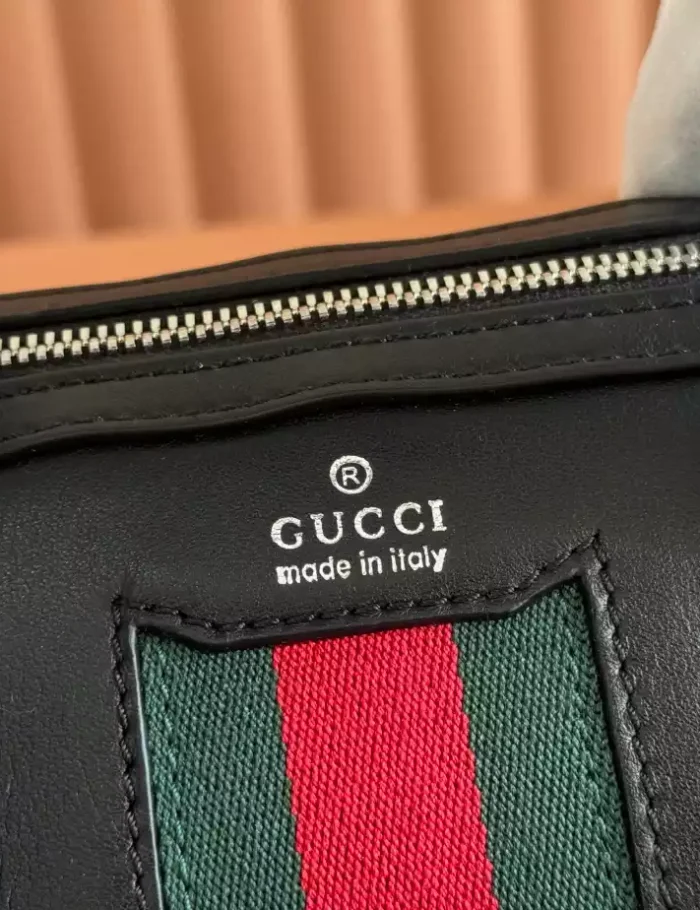GUCCI-WEB-TRADEMARK-SMALL-DUFFLE-BAG-IN-BLACK-LEATHER-BG138-6.webp