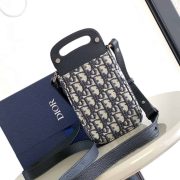 dior-saddle-vertical-pouch-with-strap-dio048-cnmvl.jpg