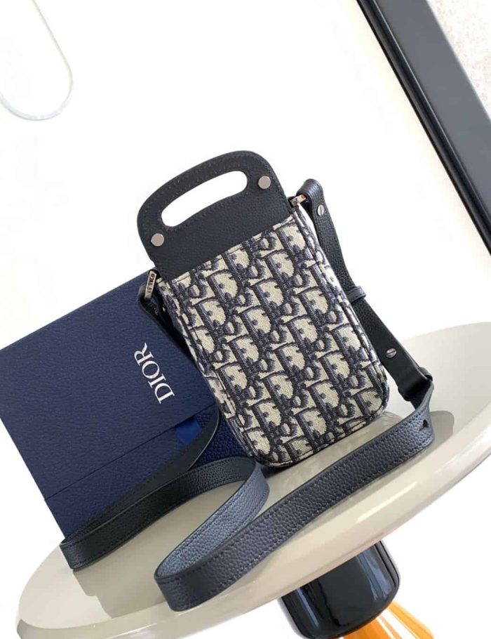 dior-saddle-vertical-pouch-with-strap-dio048-cnmvl.jpg