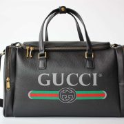 gucci-retro-logo-print-leather-duffle-bag-bg039-qn24l.jpg